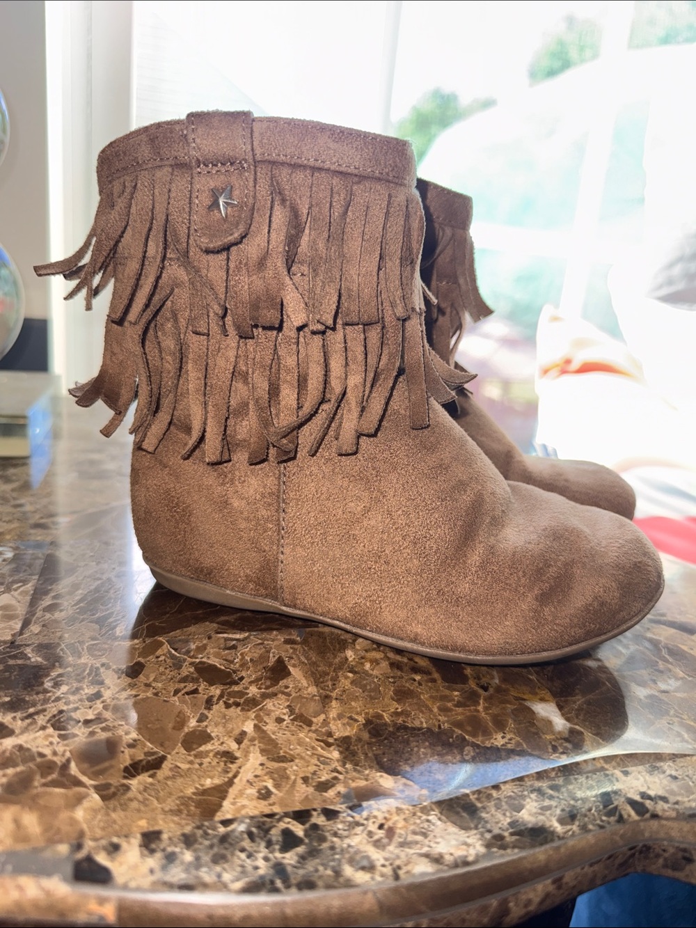 Size 10 toddler girls brown  fringe boots by Jumping Beans.